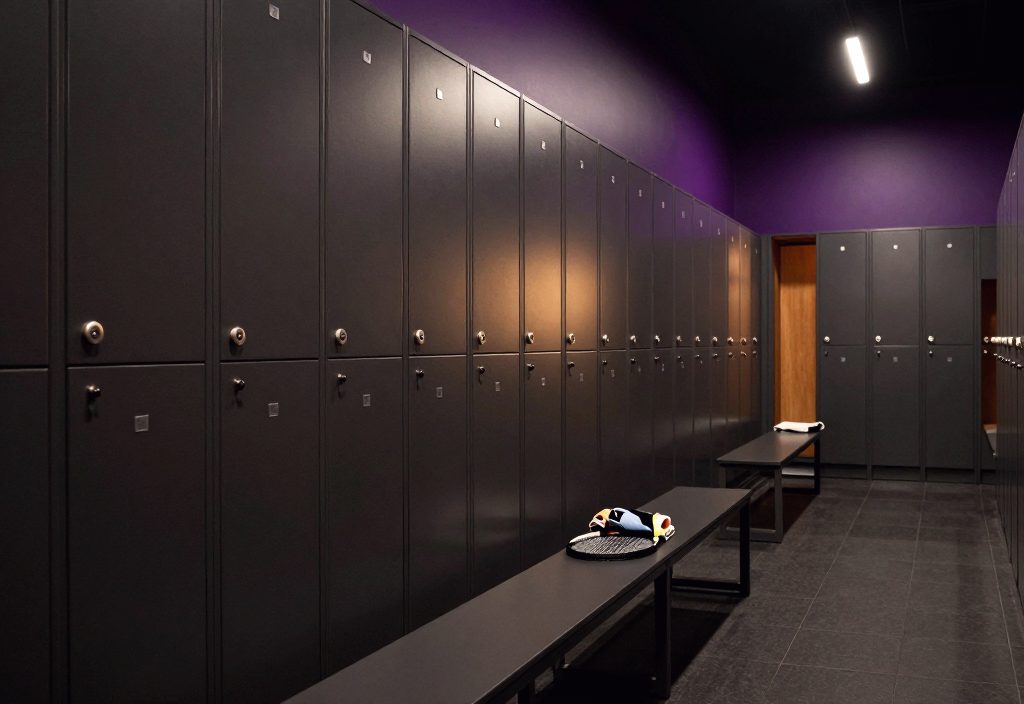 A row of lockers in a sports centre changing area
